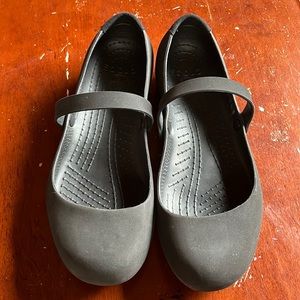 Mary Jane style shoes by Crocs. In black women’s size 9